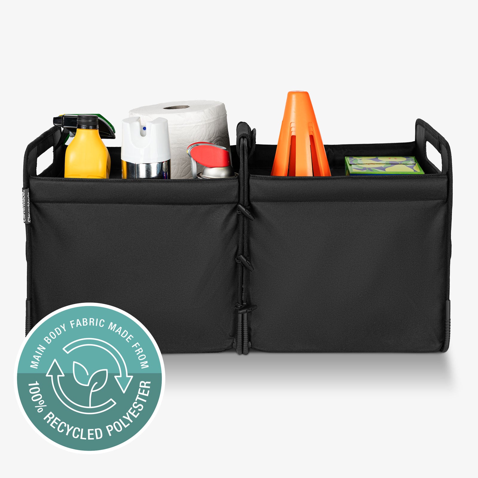Black car trunk organizer made of 100% recycled polyester with various items on a white background