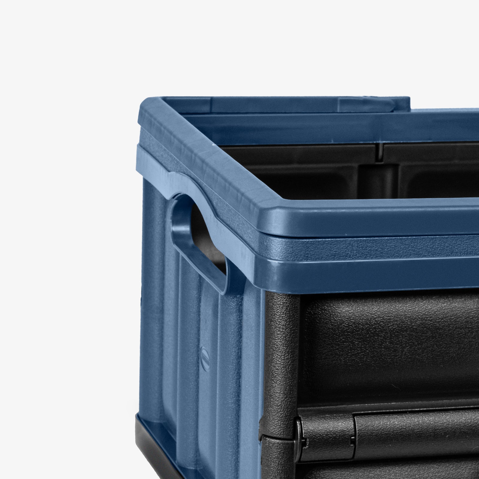 Blue and black storage crate on a white background