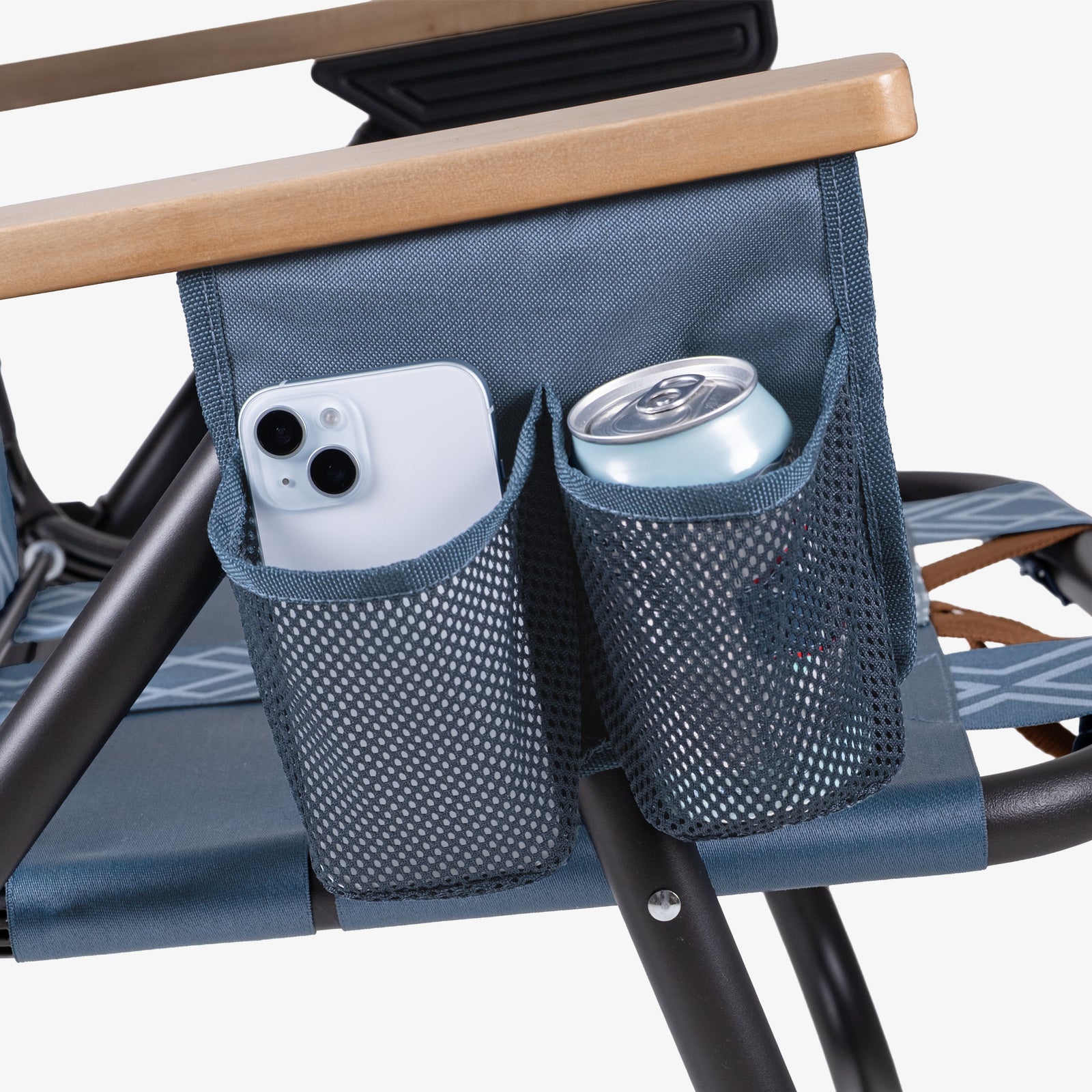 Blue Kove foldable outdoor chair with a mesh side pocket holding a phone and a can on a white background