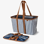 Striped tote bag with brown handles on a white background