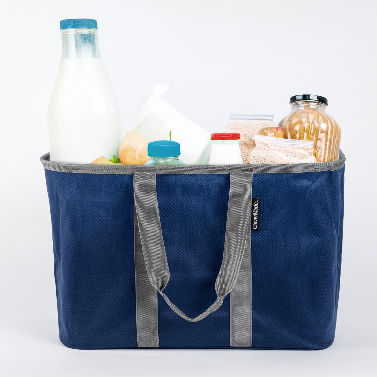 A blue and gray pop-up tote with groceries inside