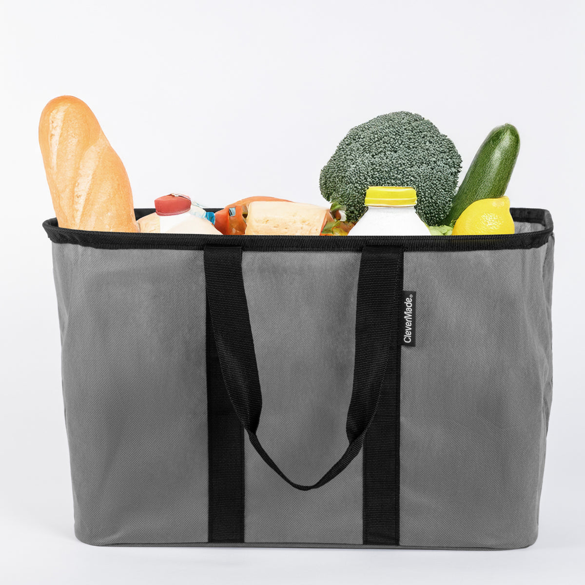 A gray and black pop-up tote with groceries inside