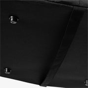 Close-up of a black laundry caddy with a visible stitching detail