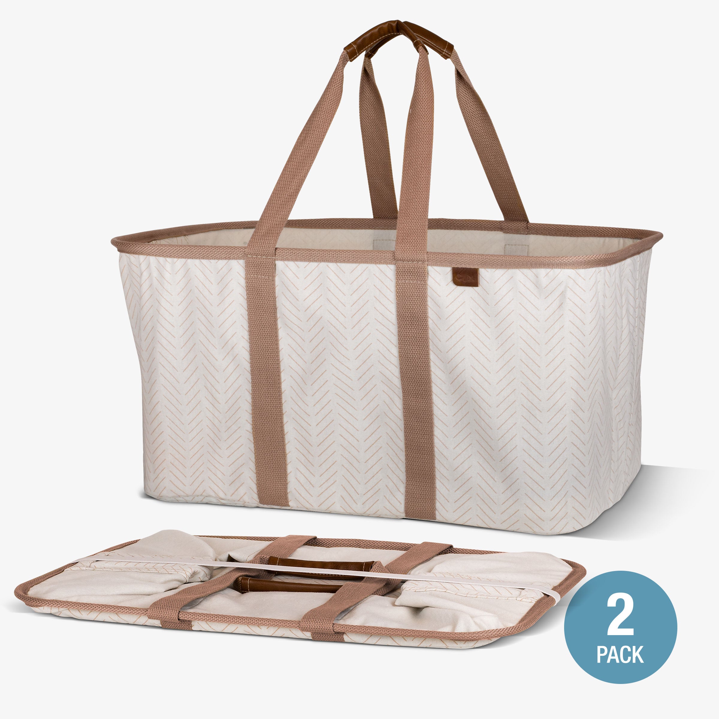 Large beige laundry tote LUXE bag with brown handles and a smaller mat below on a white background