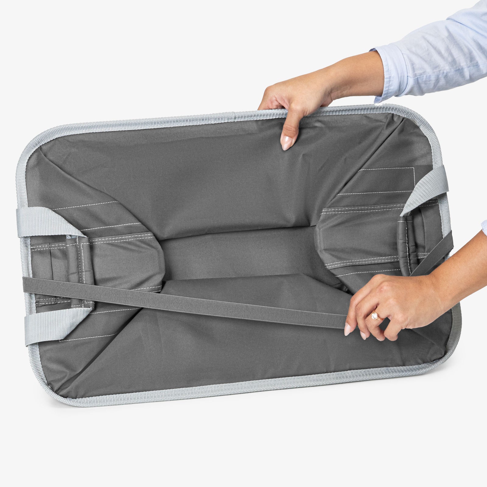 Folded large gray collapsible laundry basket