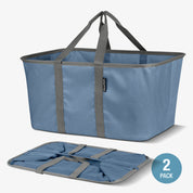 Blue folding shopping cart with gray handles on a white background