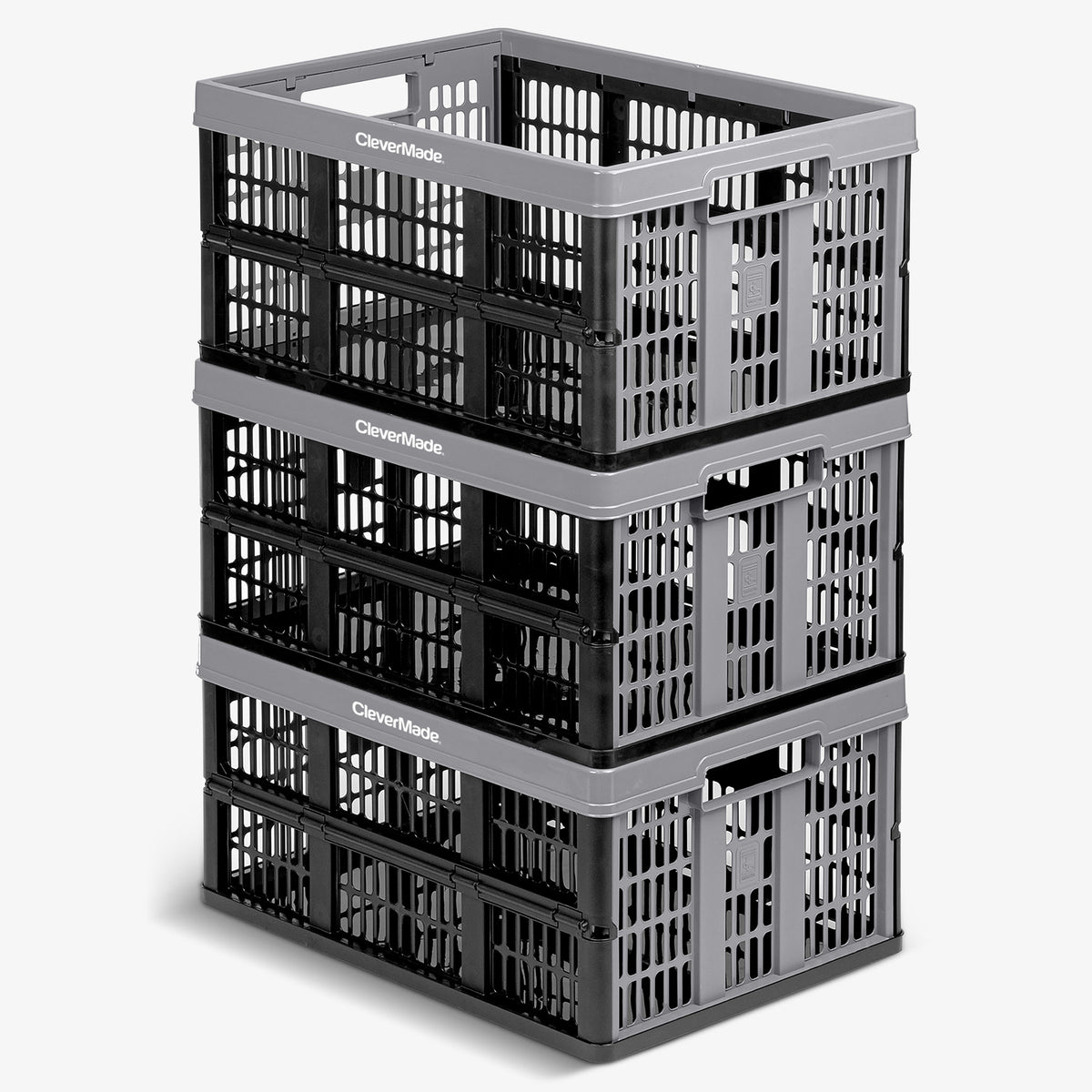 Stack of three gray CleverMade collapsible utility crates on a white background