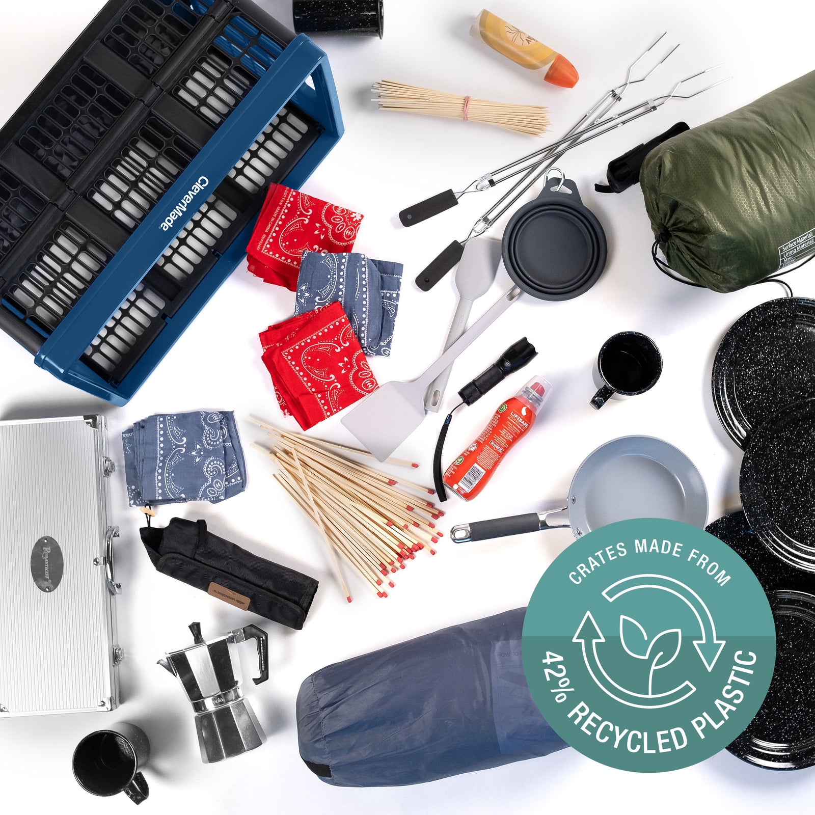 Collection of camping and outdoor gear and blue crate with a focus on sustainability, featuring a green label indicating recycled plastic content.