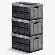 A three-layered 62L gray-black stackable collapsible storage bin with CleverMade logo