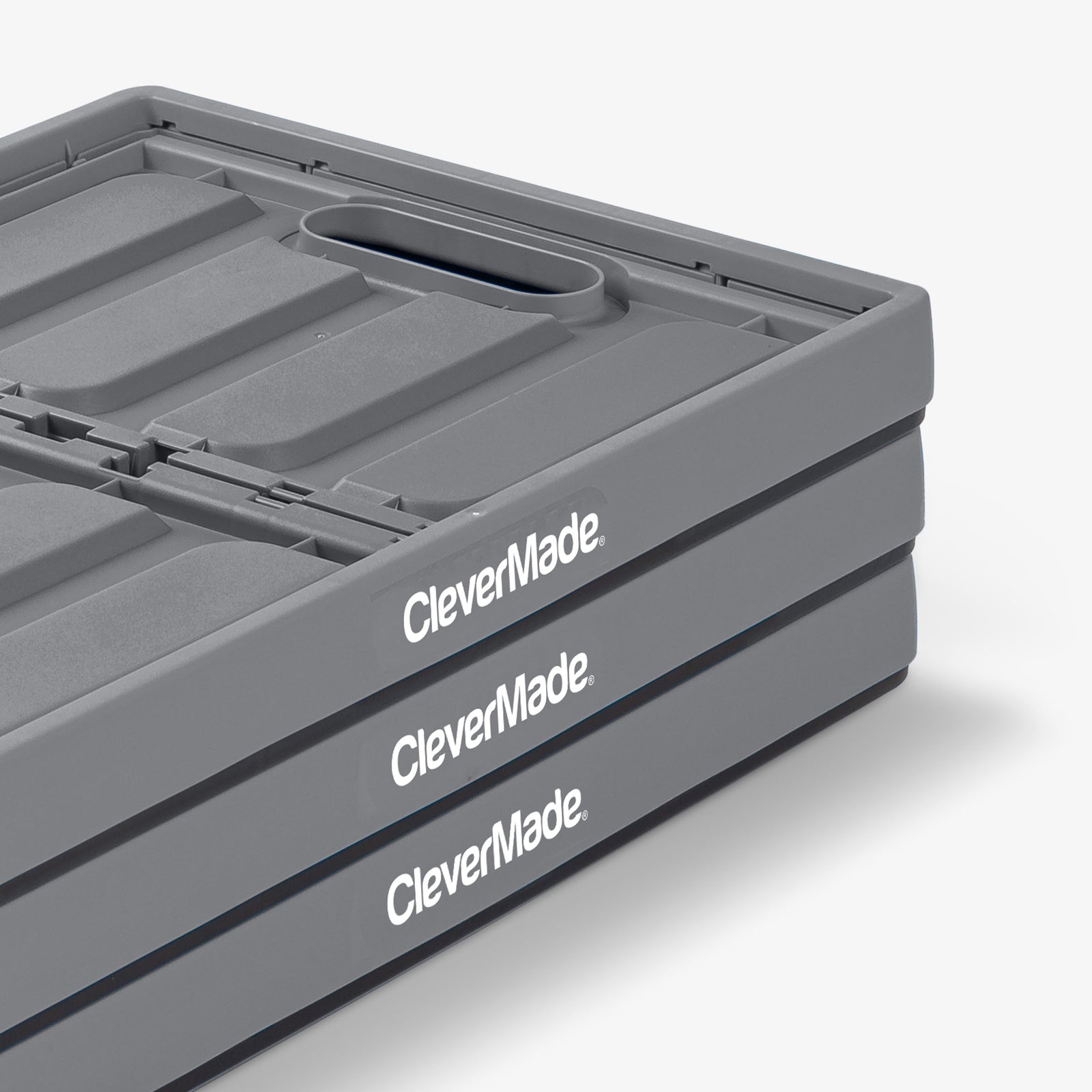 A gray and black collapsible storage bins with lid with 'CleverMade' branding on a white background