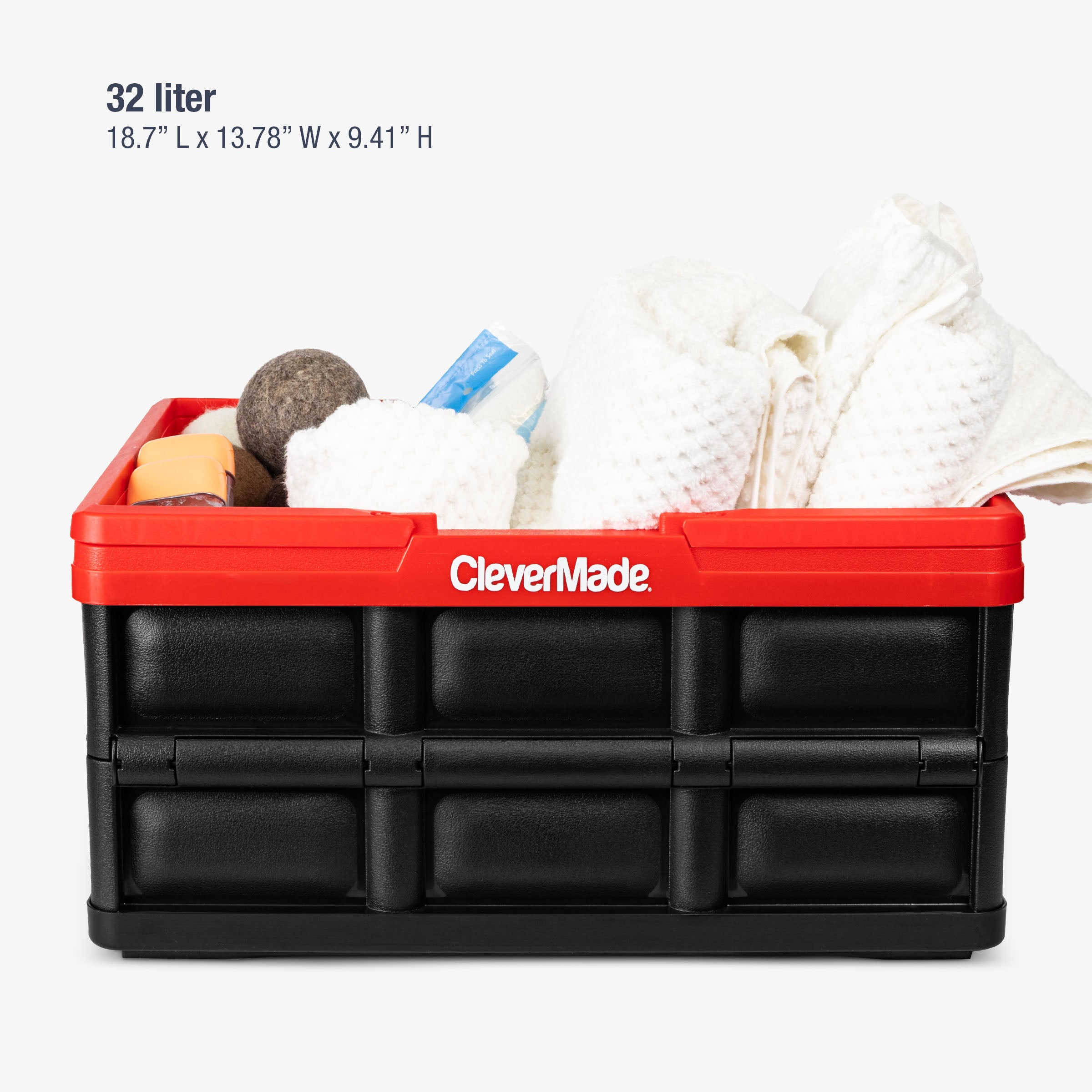 Black-Red storage bin containing household items on a white background, featuring the brand 'CleverMade'.