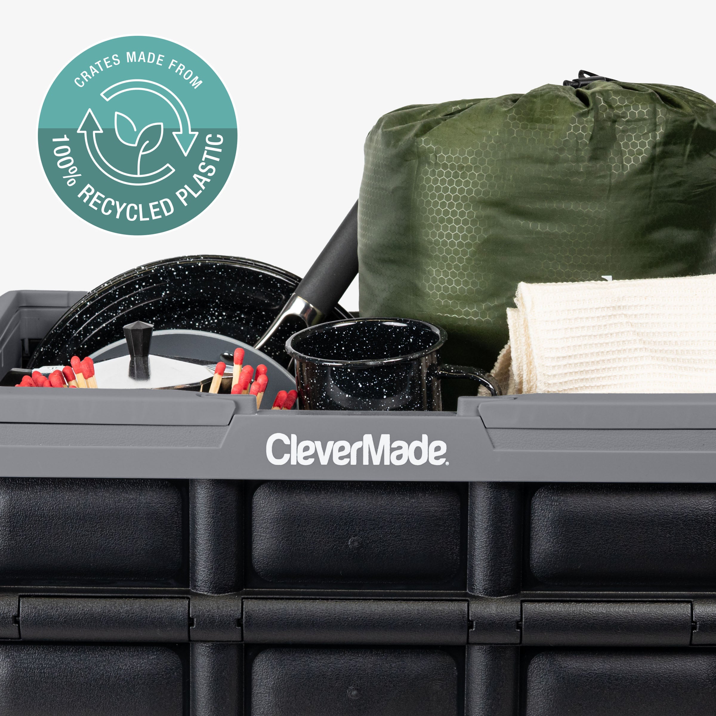 Gray-Black storage container with gardening tools and a green bag, featuring CleverMade branding and a recycling logo.