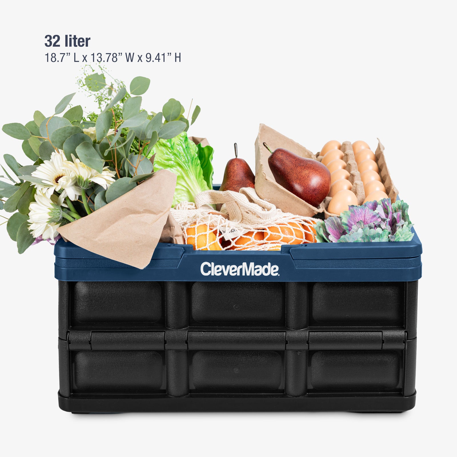 Blue and Black CleverMade storage crate filled with groceries on a white background