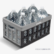 A gray and black collapsible shopping basket for carrying multiple bottles of water