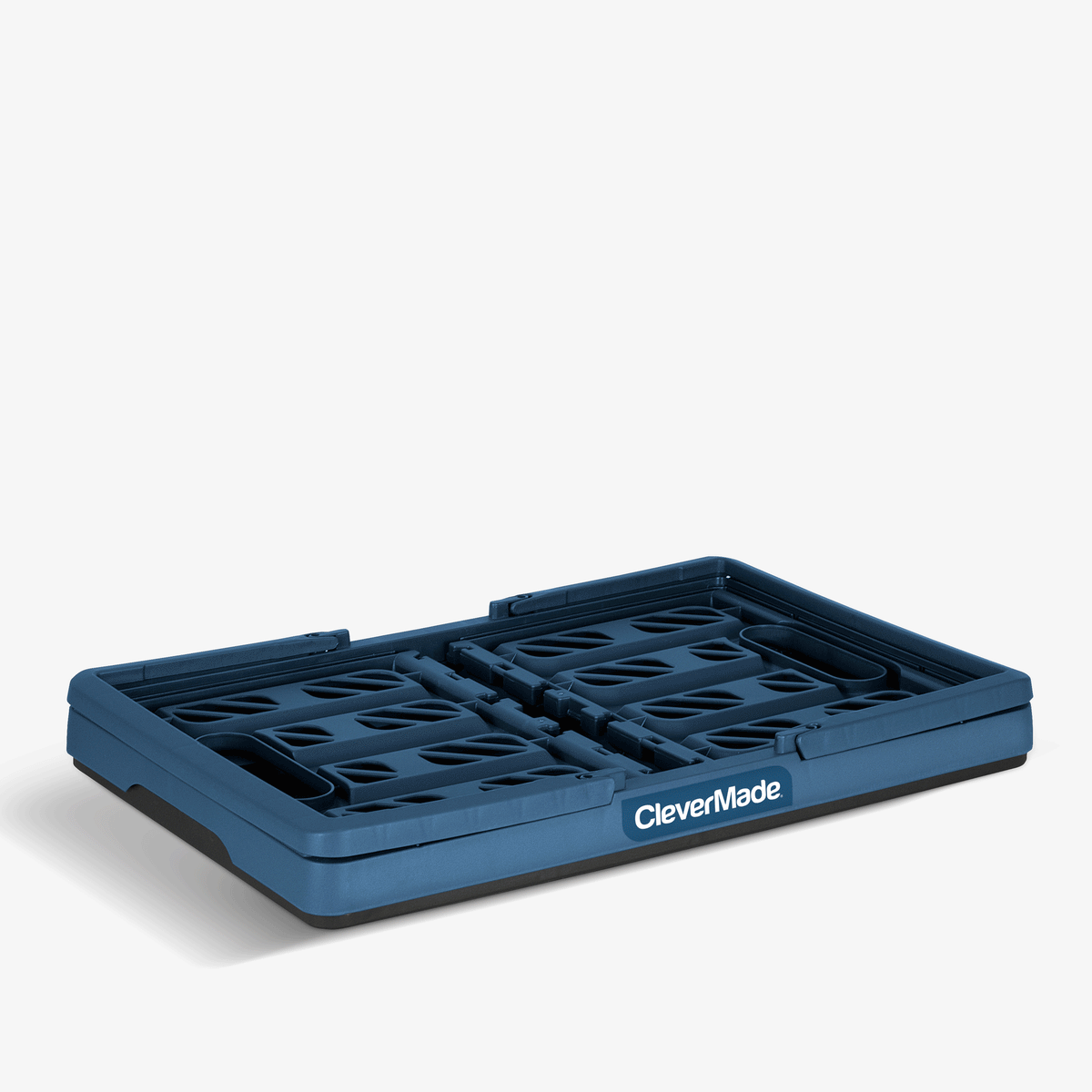 A navy and black collapsible shopping basket with the brand name CleverMade 