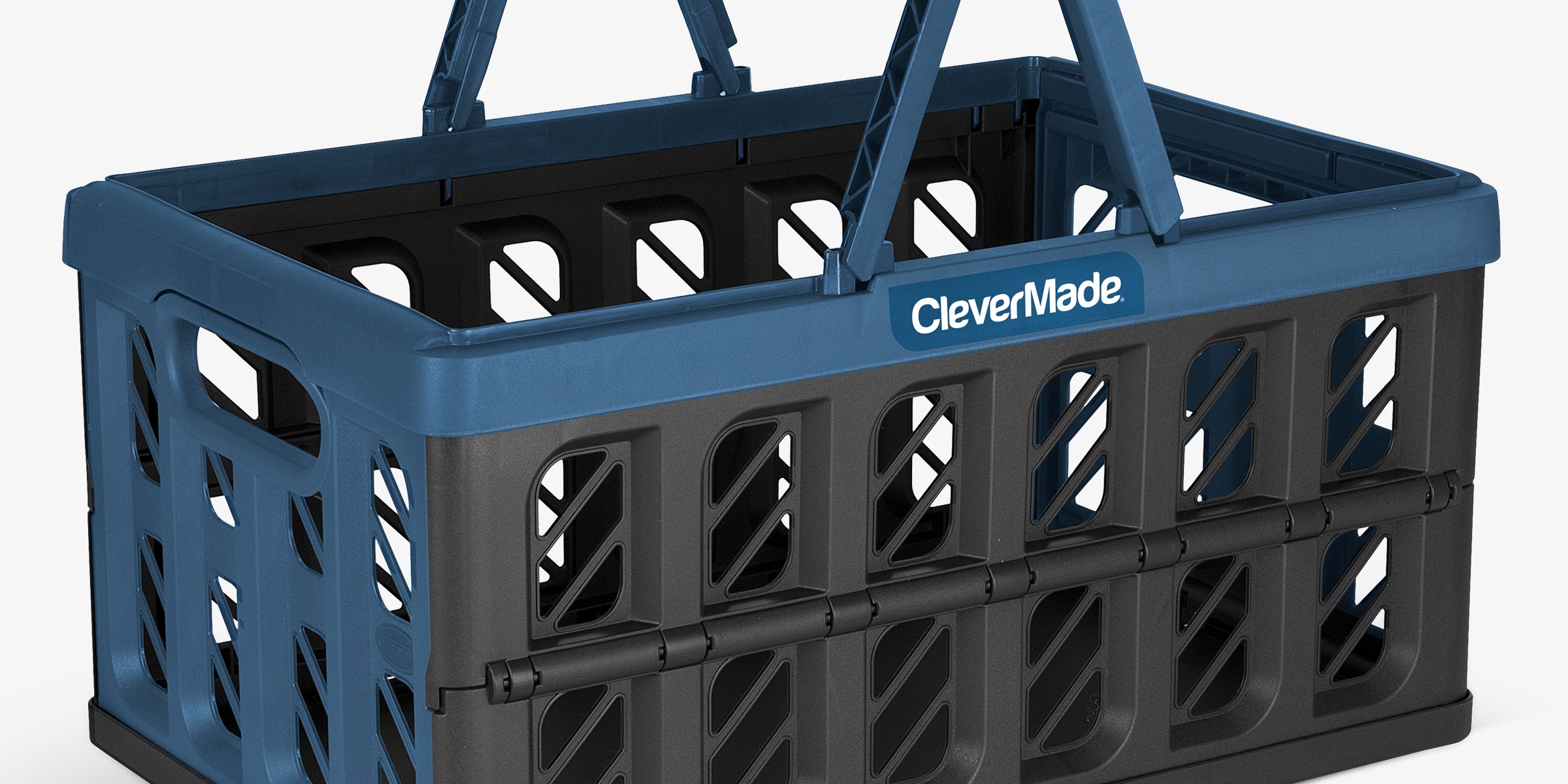 A navy and black collapsible shopping basket with the brand name CleverMade visible on the side.