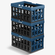 A three-layered navy and black stackable collapsible shopping basket with the brand name CleverMade.