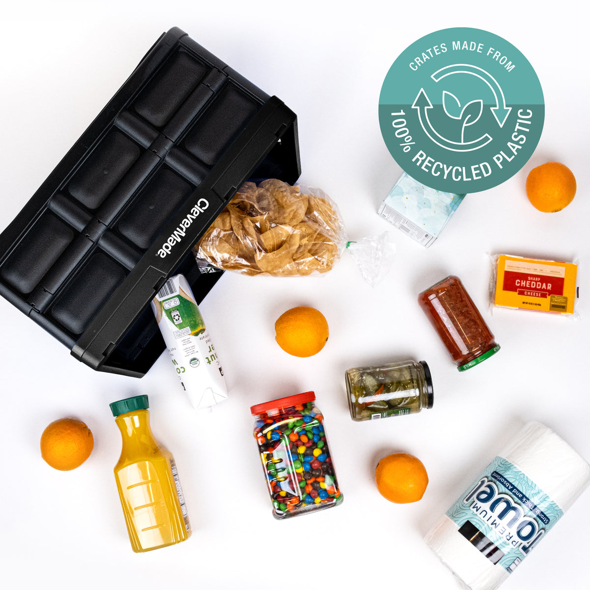 A black recycled plastic collapsible storage bins with scattered grocery items