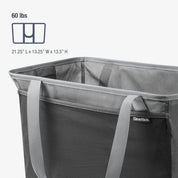Gray CleverMade laundry tote bag with dimensions and weight capacity on a white background