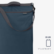 Blue garment bag with carrying handle and shoulder strap on a white background