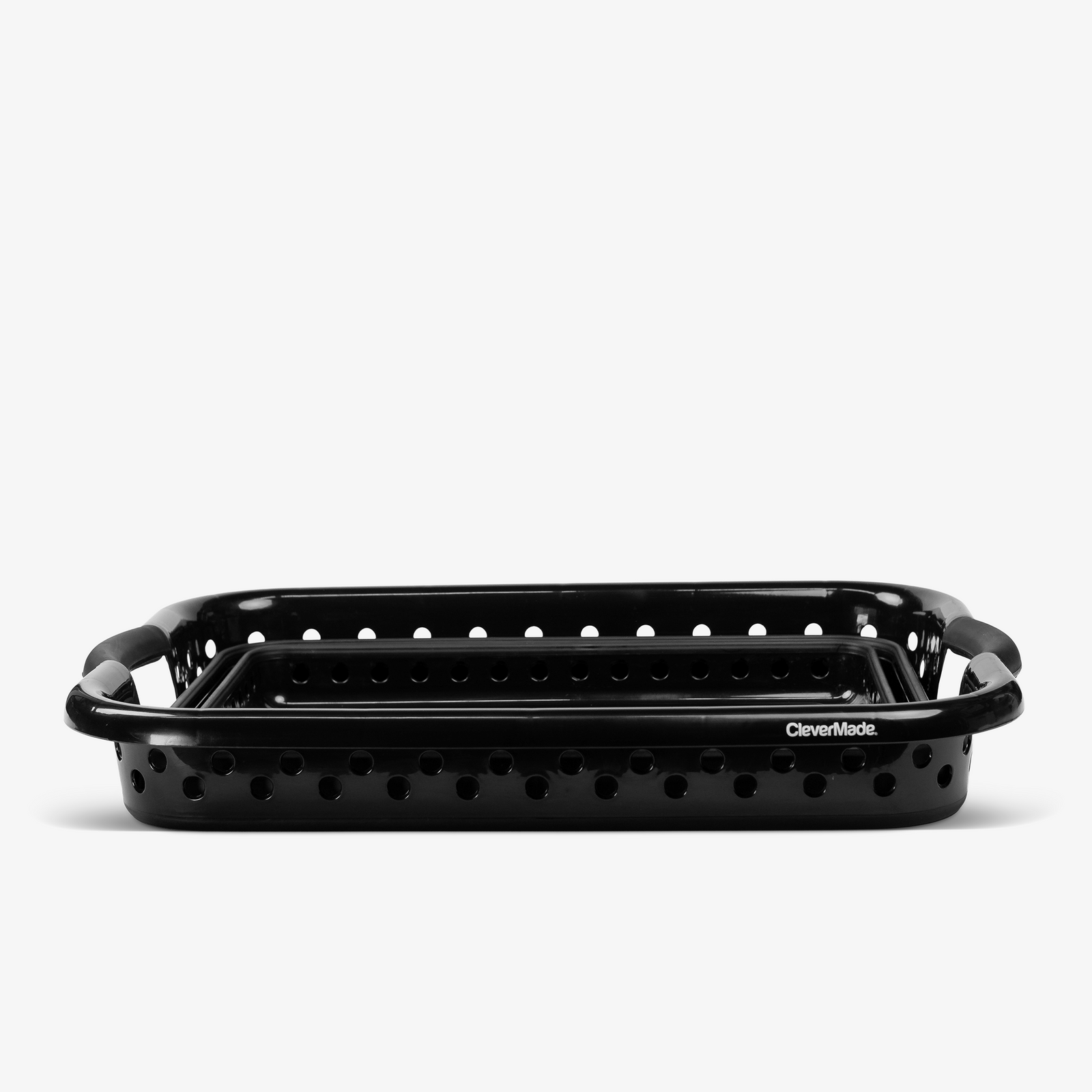Black collapsible plastic laundry baskets on a white background