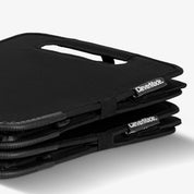 Stack of black CleverMade trunk caddy  on a white background