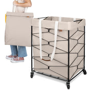 Beige laundry basket with geometric design and wheels, held by a person.