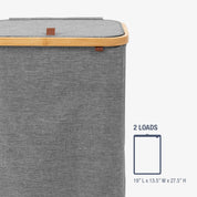 Gray laundry basket with wooden handle and dimensions on a white background