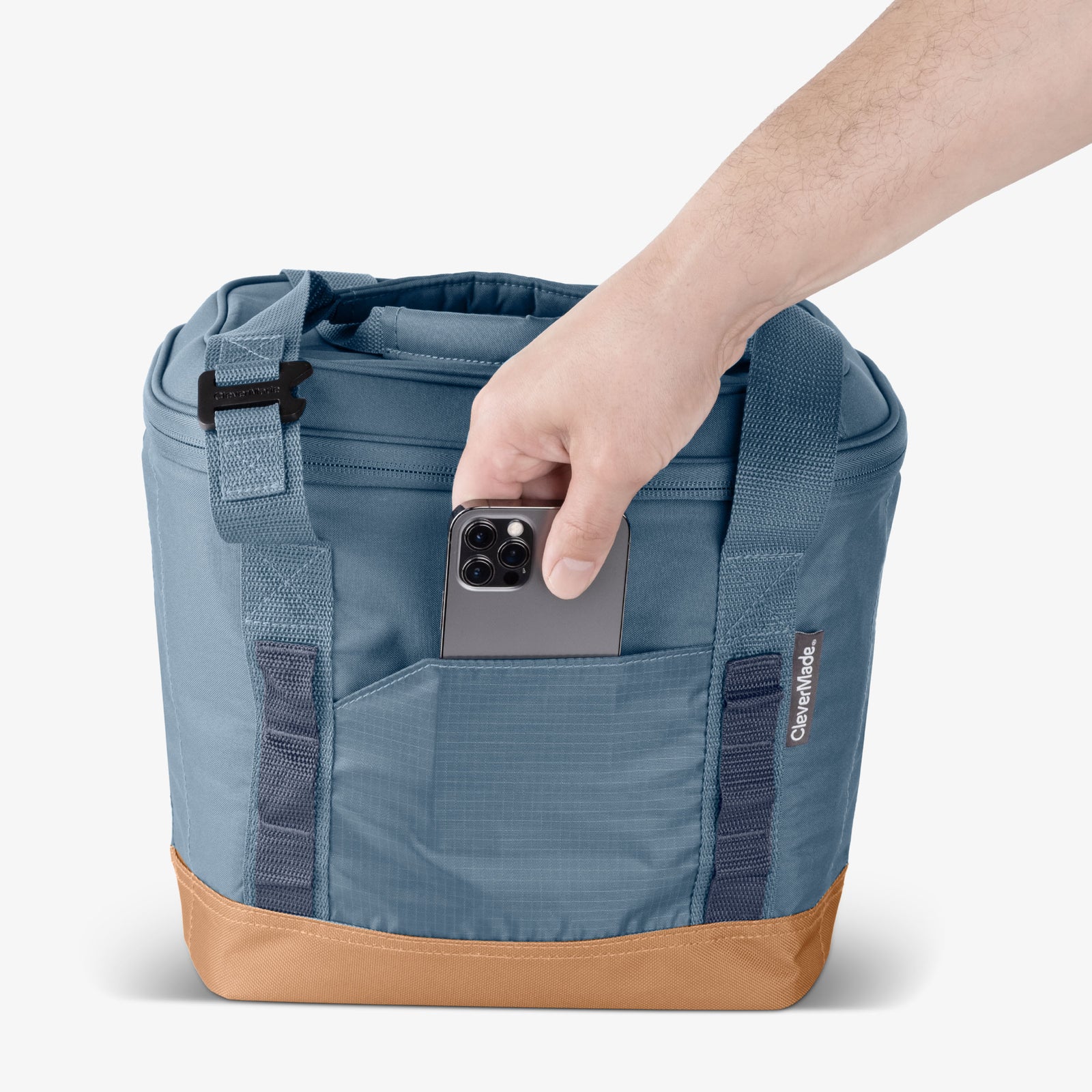 Blue cooler bag with a hand holding a phone, on a white background