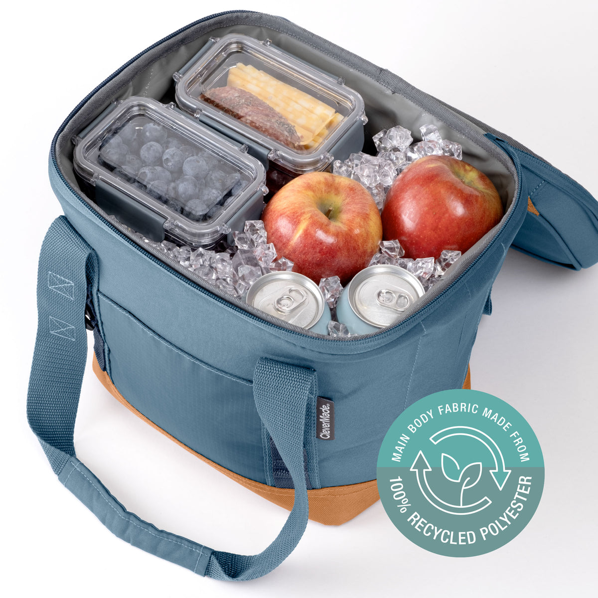 Blue cooler bag with food items and a '100% Recycled Polyester' label on a white background