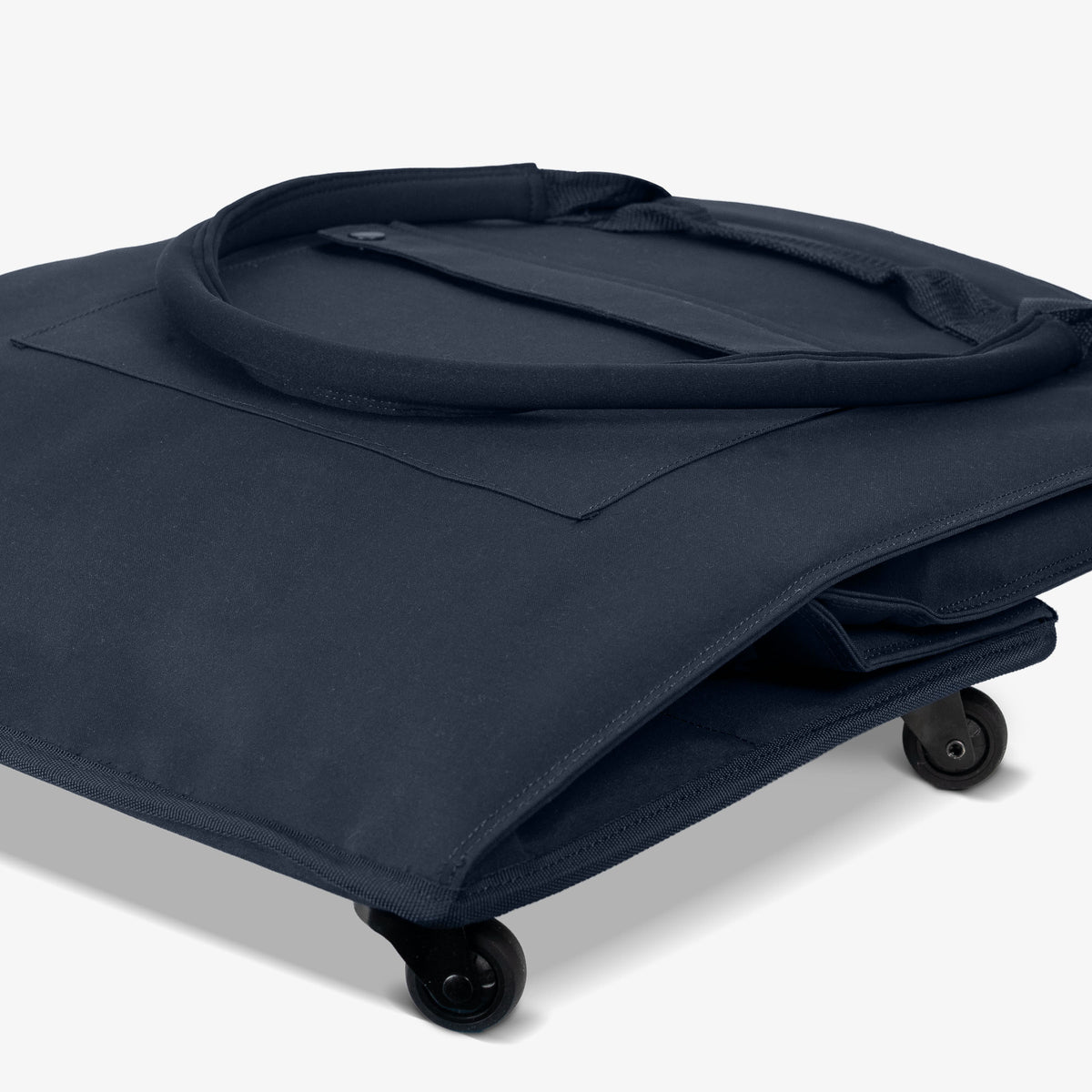 Dark blue garment on a rolling dolly with wheels on a white background