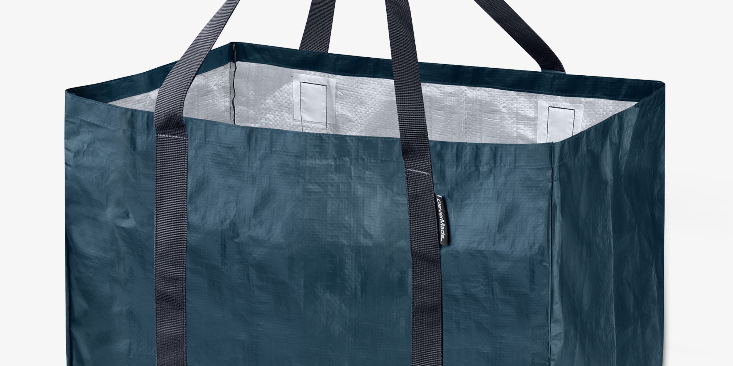 Large blue tote bag with black straps on a white background, labeled '2 Pack'.