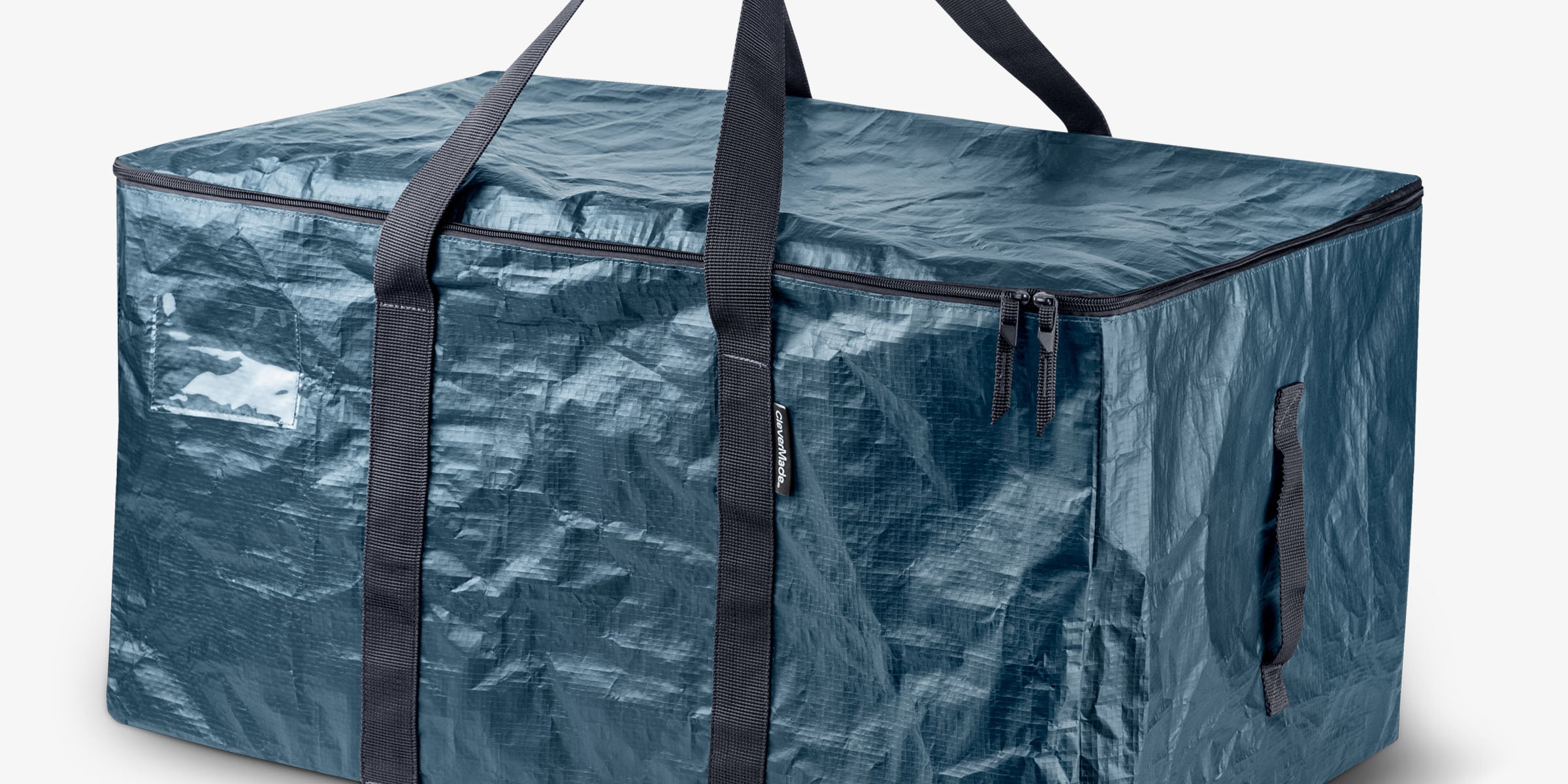 Blue storage bag with black straps on a light gray background