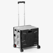 A collapsible wheeled crate with four wheels, a retractable handle, and a black and gray color scheme, with brand CleverMade.
